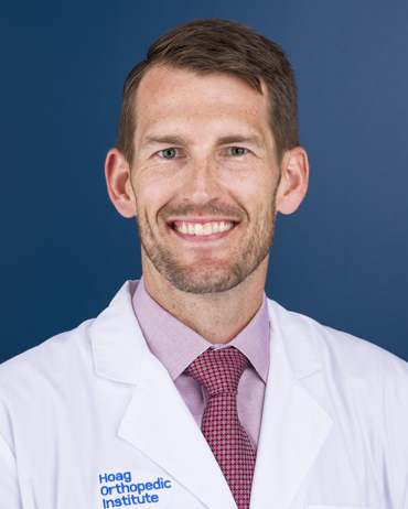 A headshot of Dr. Travis Scudday