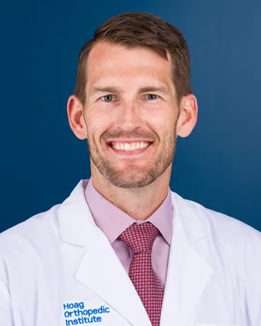 A headshot of Dr. Travis Scudday
