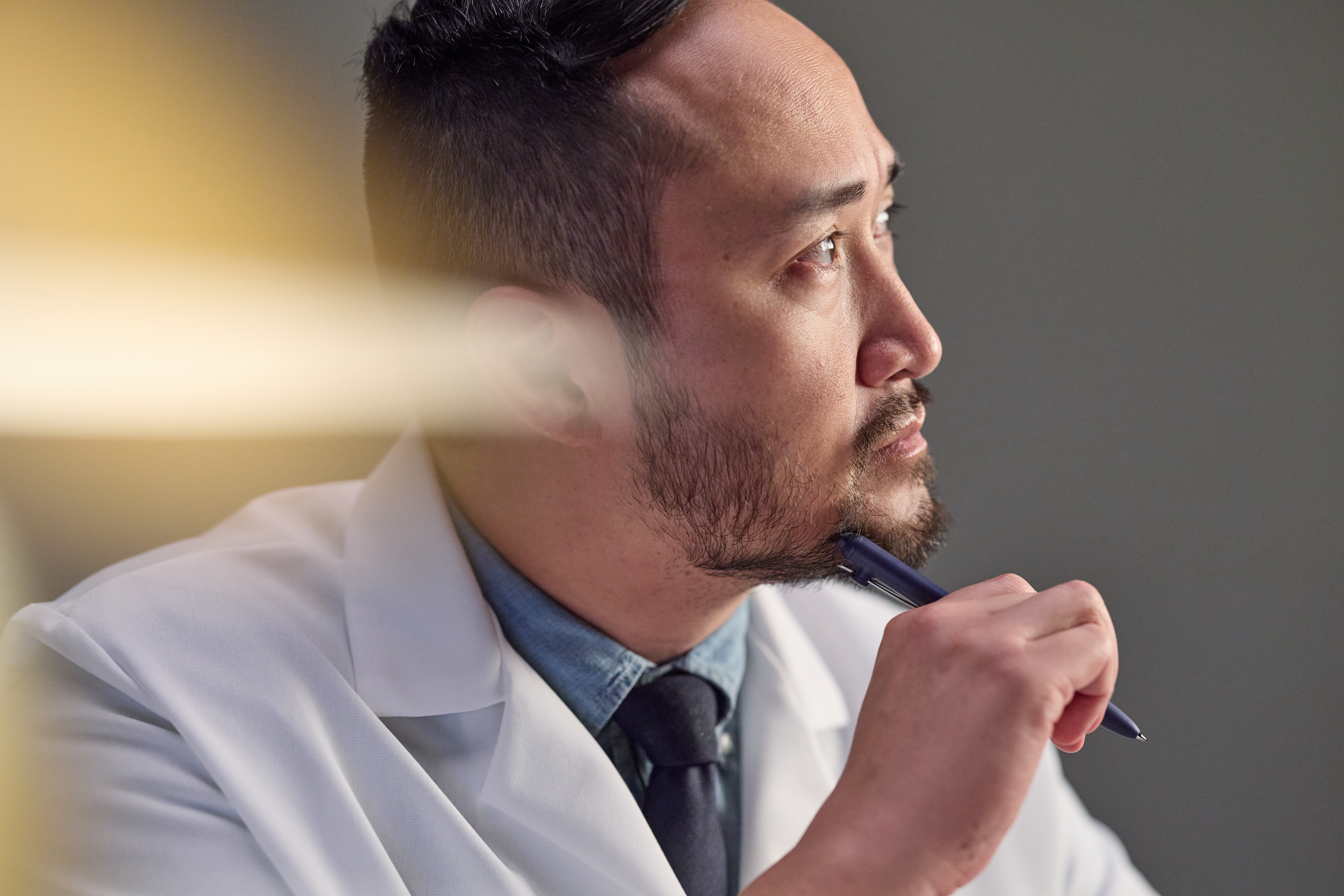 Dr. Sun portrait picture for about section on feature physician page.
