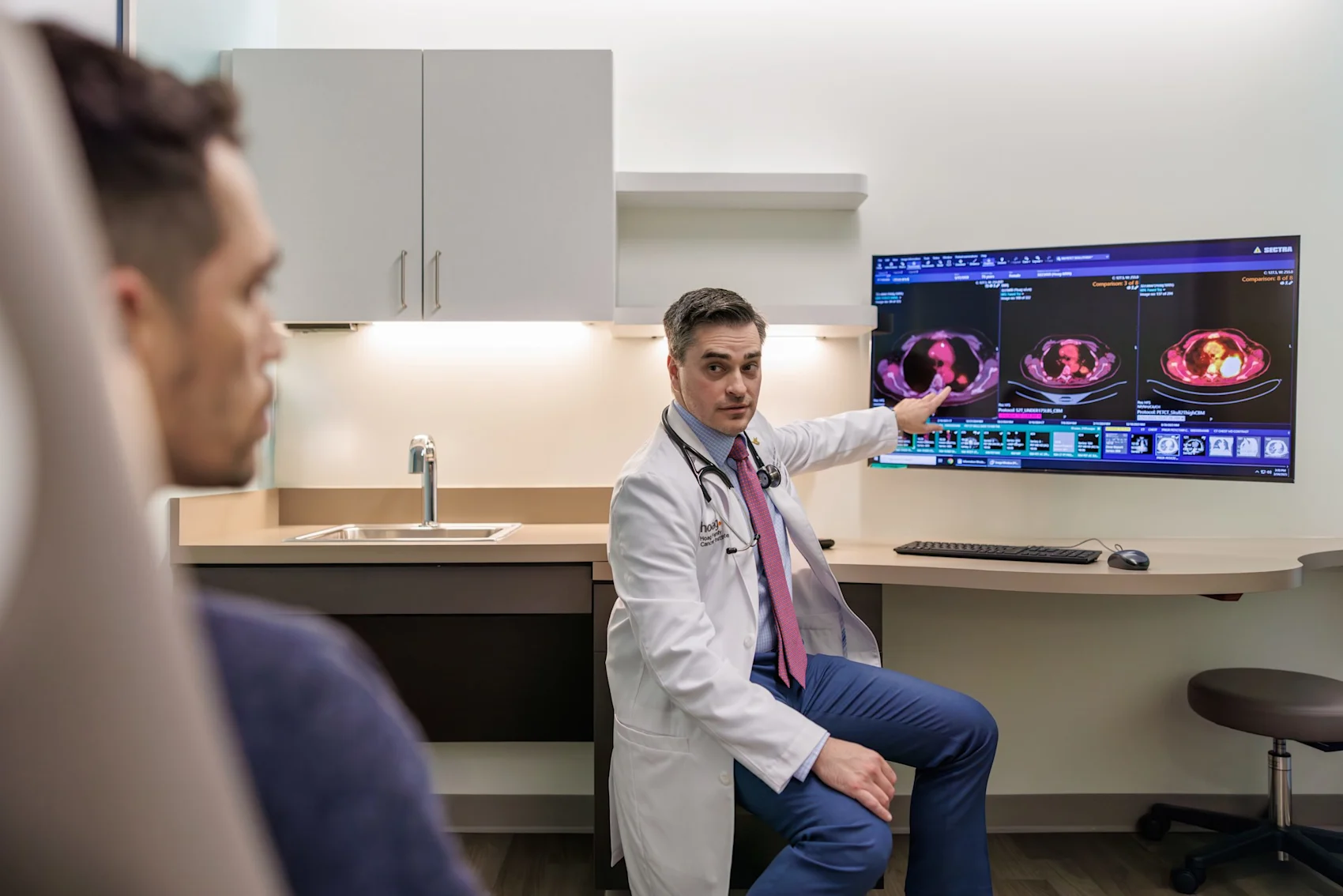 Dr. Khagi helping patient