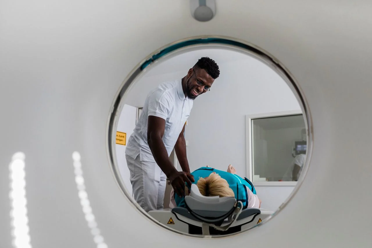 Woman being placed in MRI machine