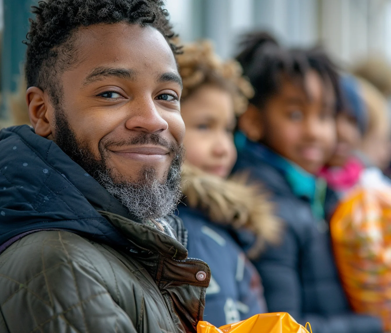 Man smiling and looking at camera