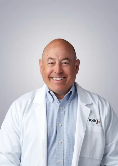 David E. Millett, MD