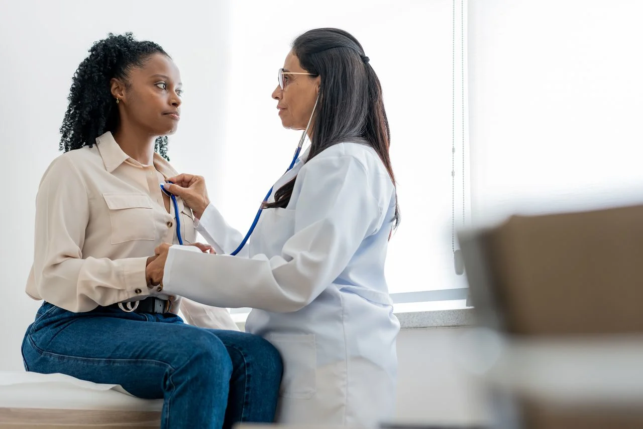 Woman checking heartbeat