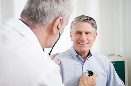 Elderly Man Getting Heart Checked