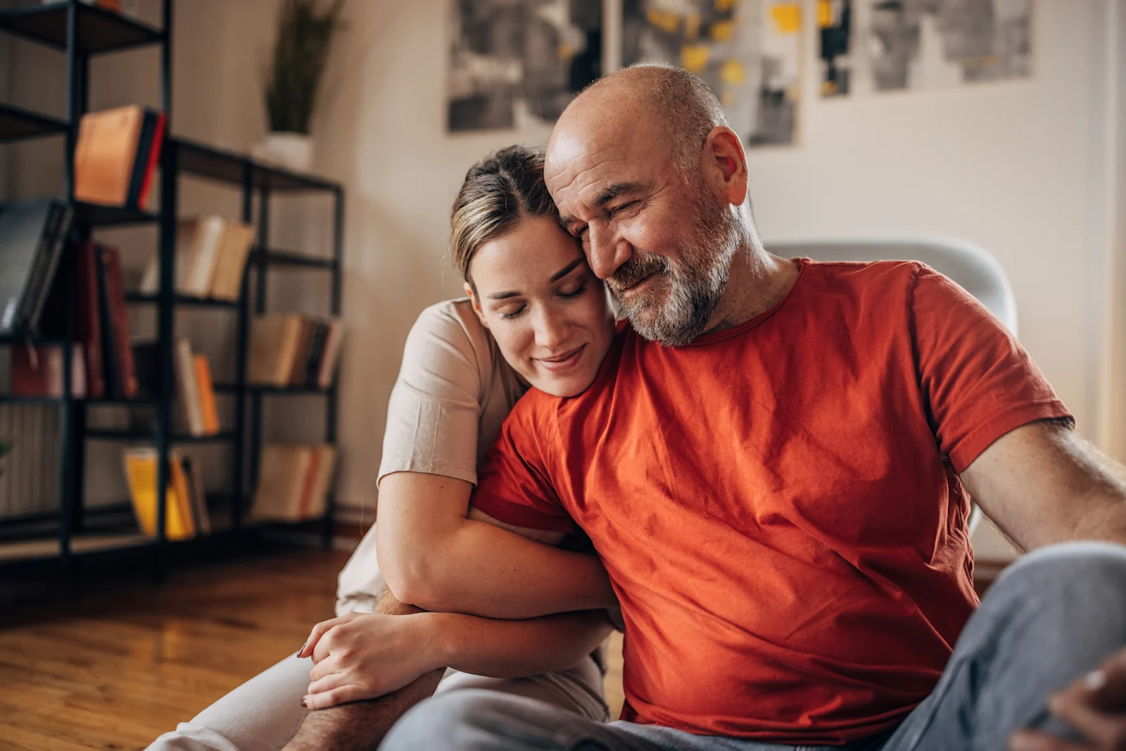 Woman hugging man's arm