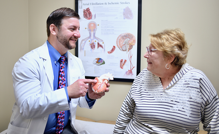 Man with Heart Model