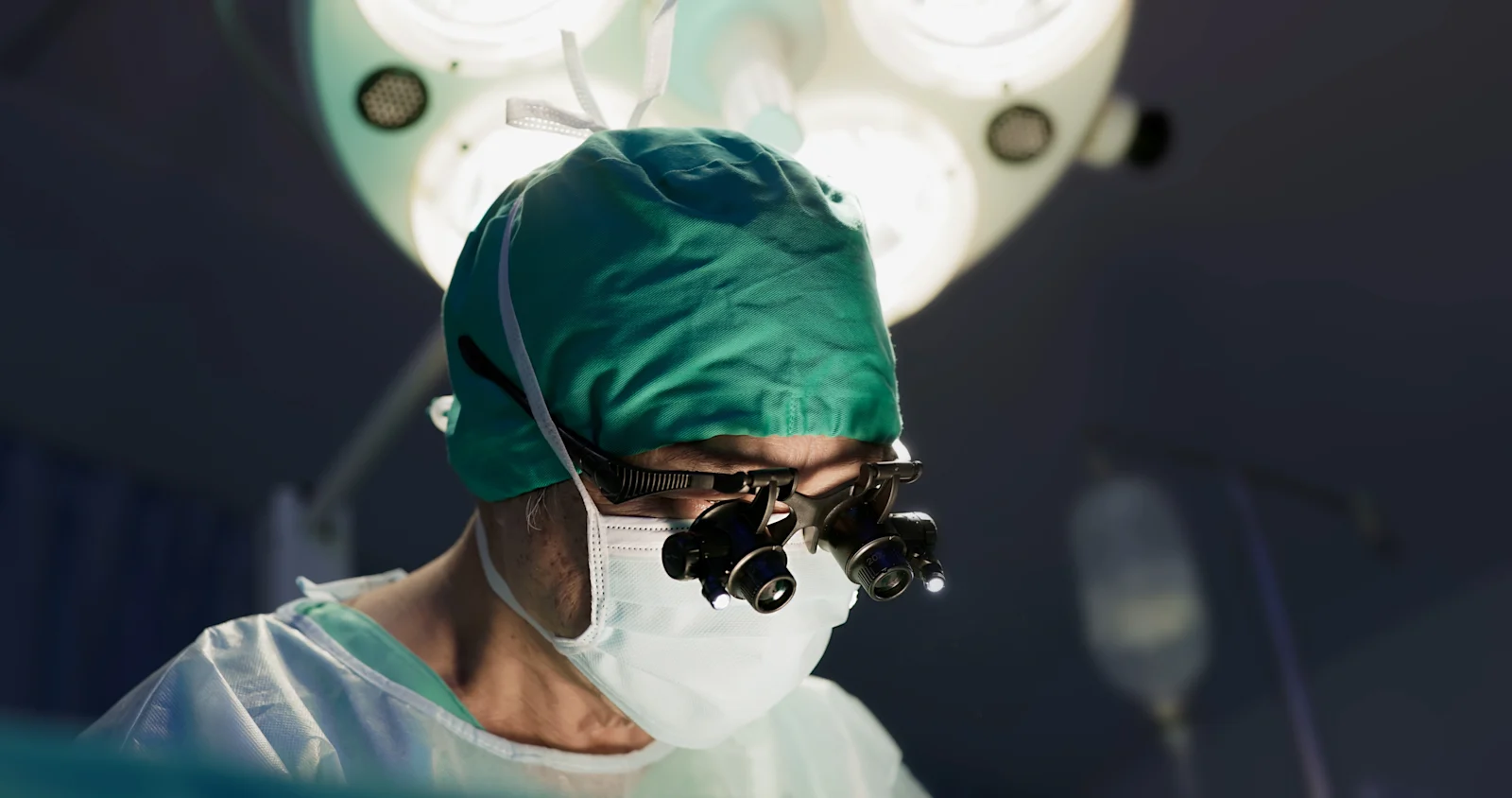 Surgeon with Magnifying Glasses