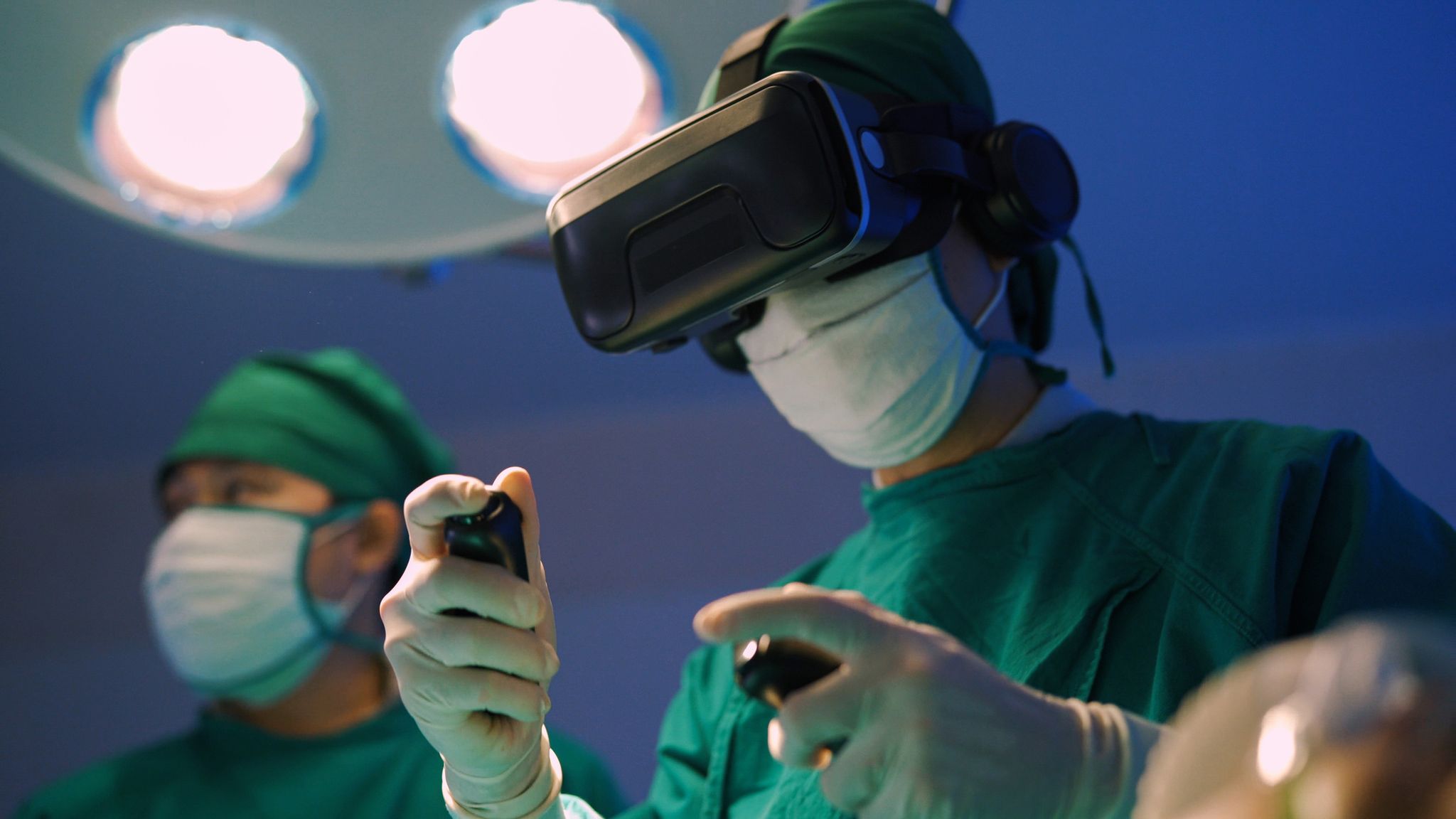 A surgeon uses a VR headset to help with surgery