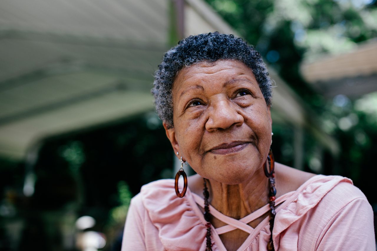 Elderly Black woman smiling