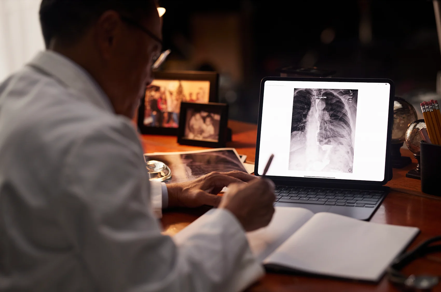 Man observing Stomach X-Ray