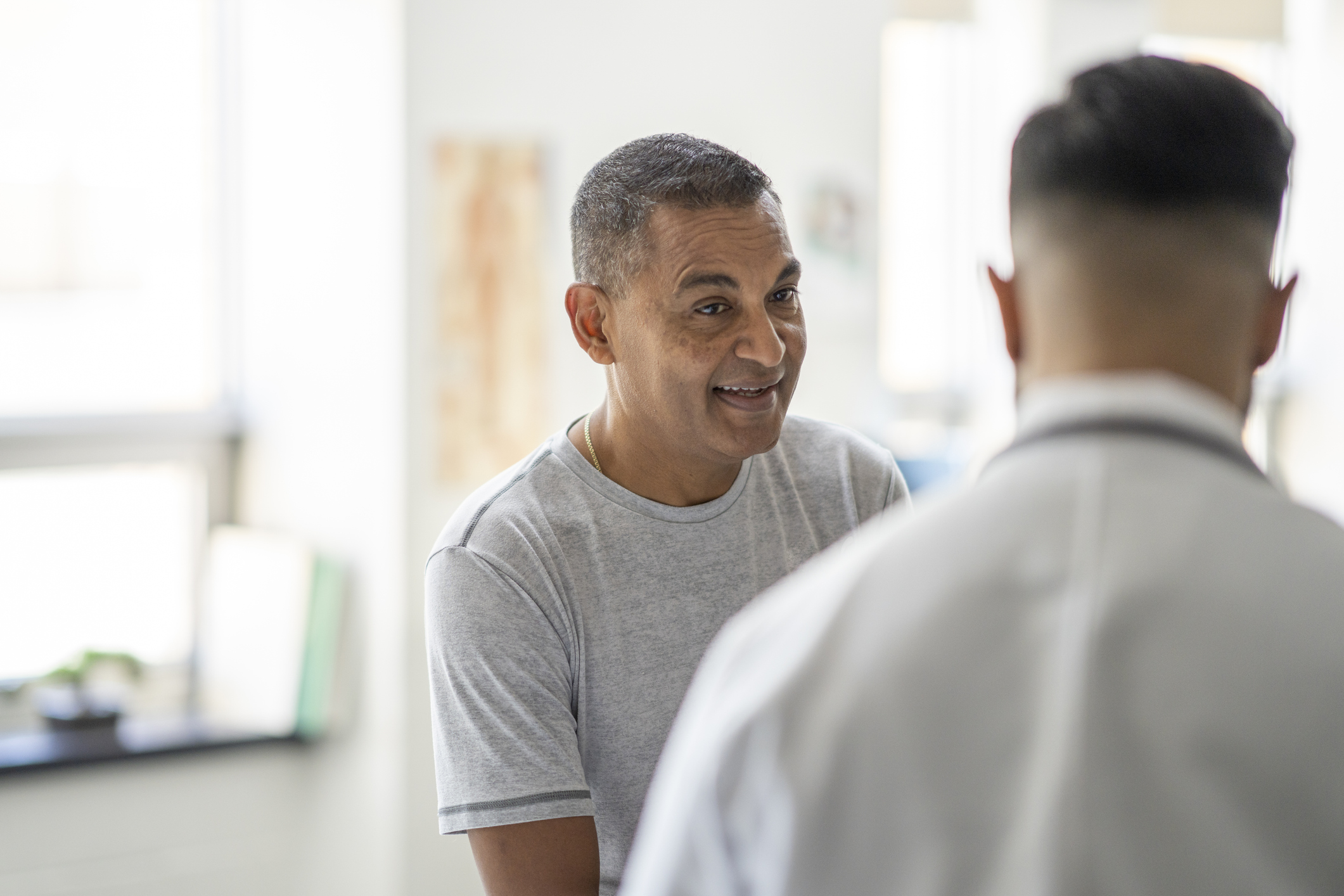 Male patient with doctor