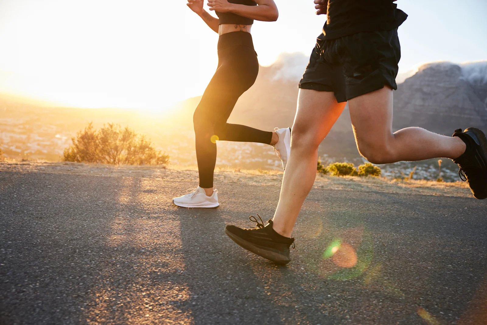 Two people running in the early morning