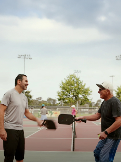 Dr. Ozgur and Dan play pickleball
