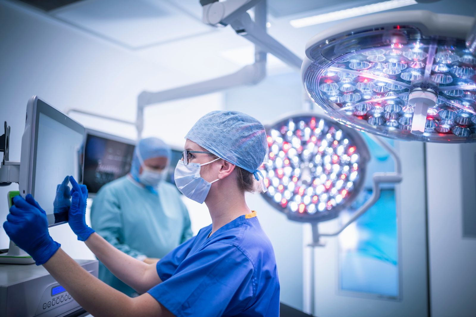 A surgeon uses some equipment