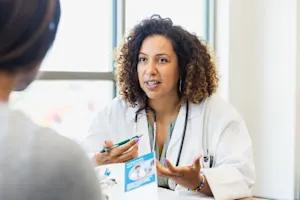 Doctor talking to patient