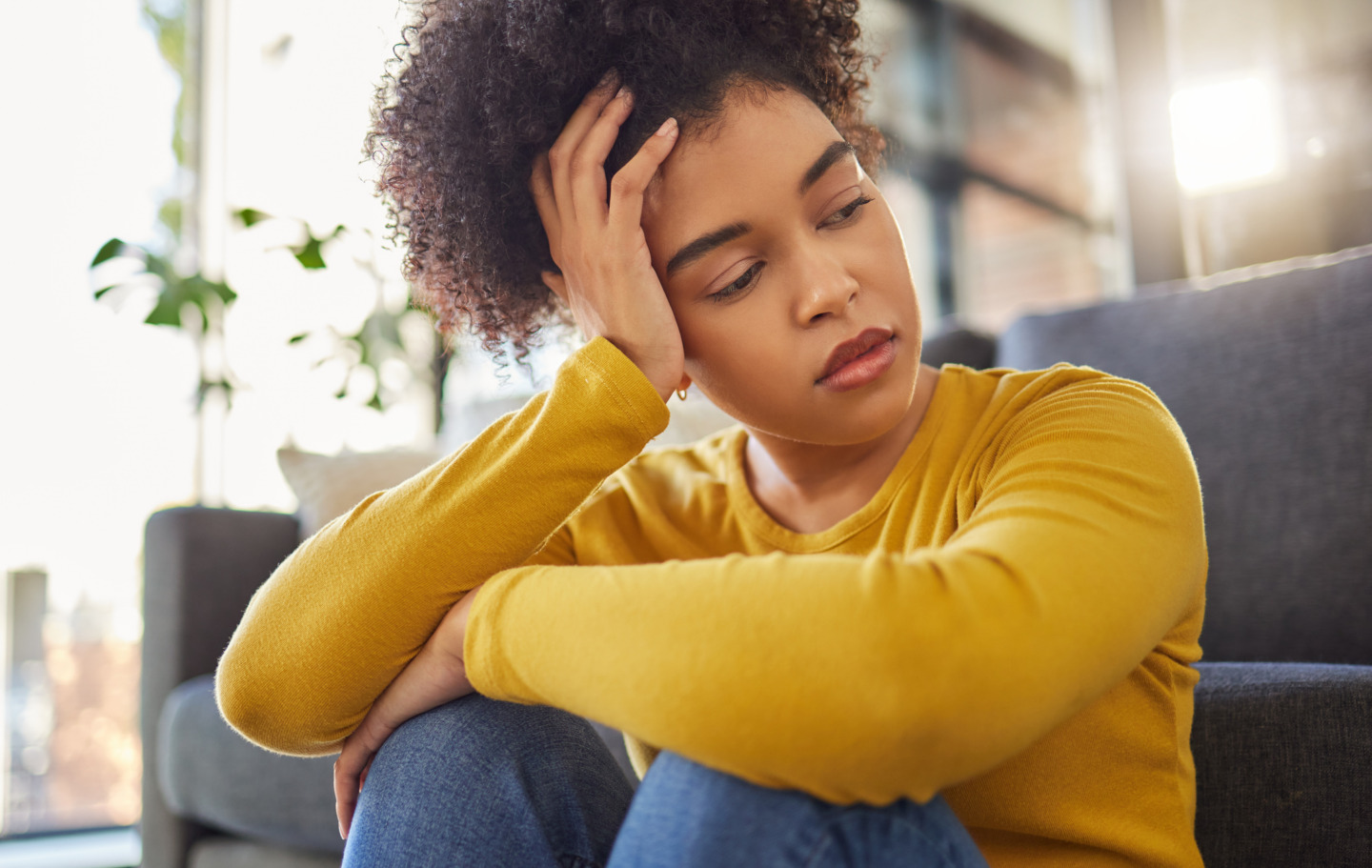 Young woman looking sad