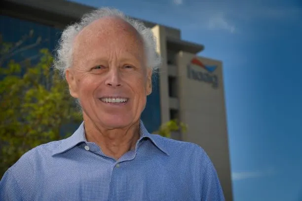 Old Man Smiling in front of Hoag