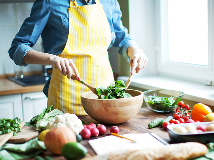 Woman Tossing Salad