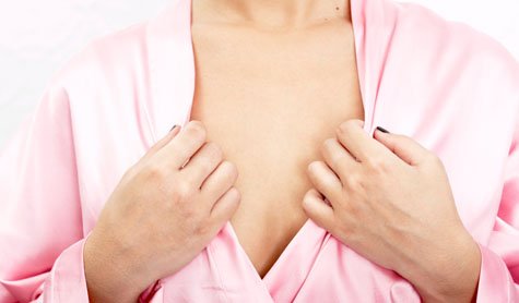A shot of the chest of woman in a bathrobe