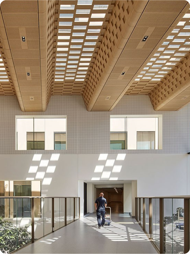 Indoor pathway with person pushing cart