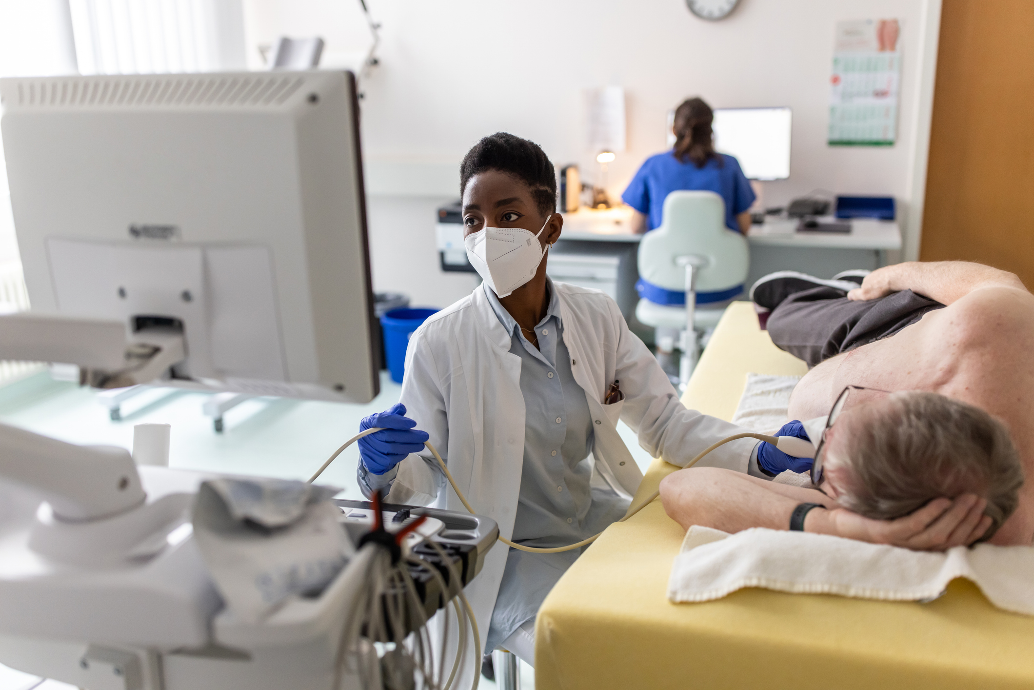 Nurse conducting ultrasound