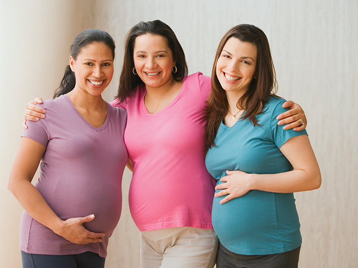 Three pregnant women