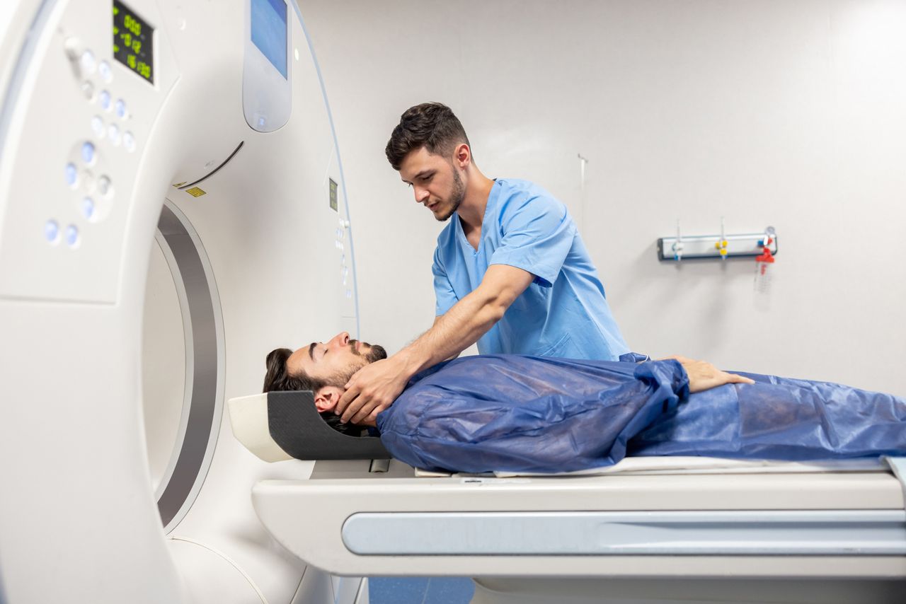 Man going into MRI Machine