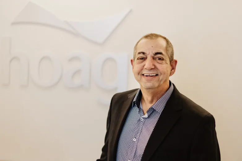 Ed Toplian, an oral cancer survivor, smiles at camera