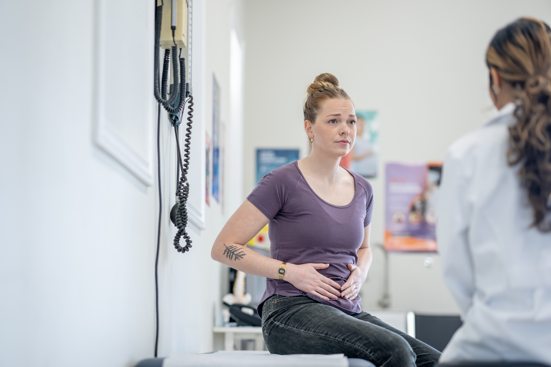 Woman holding her stomach