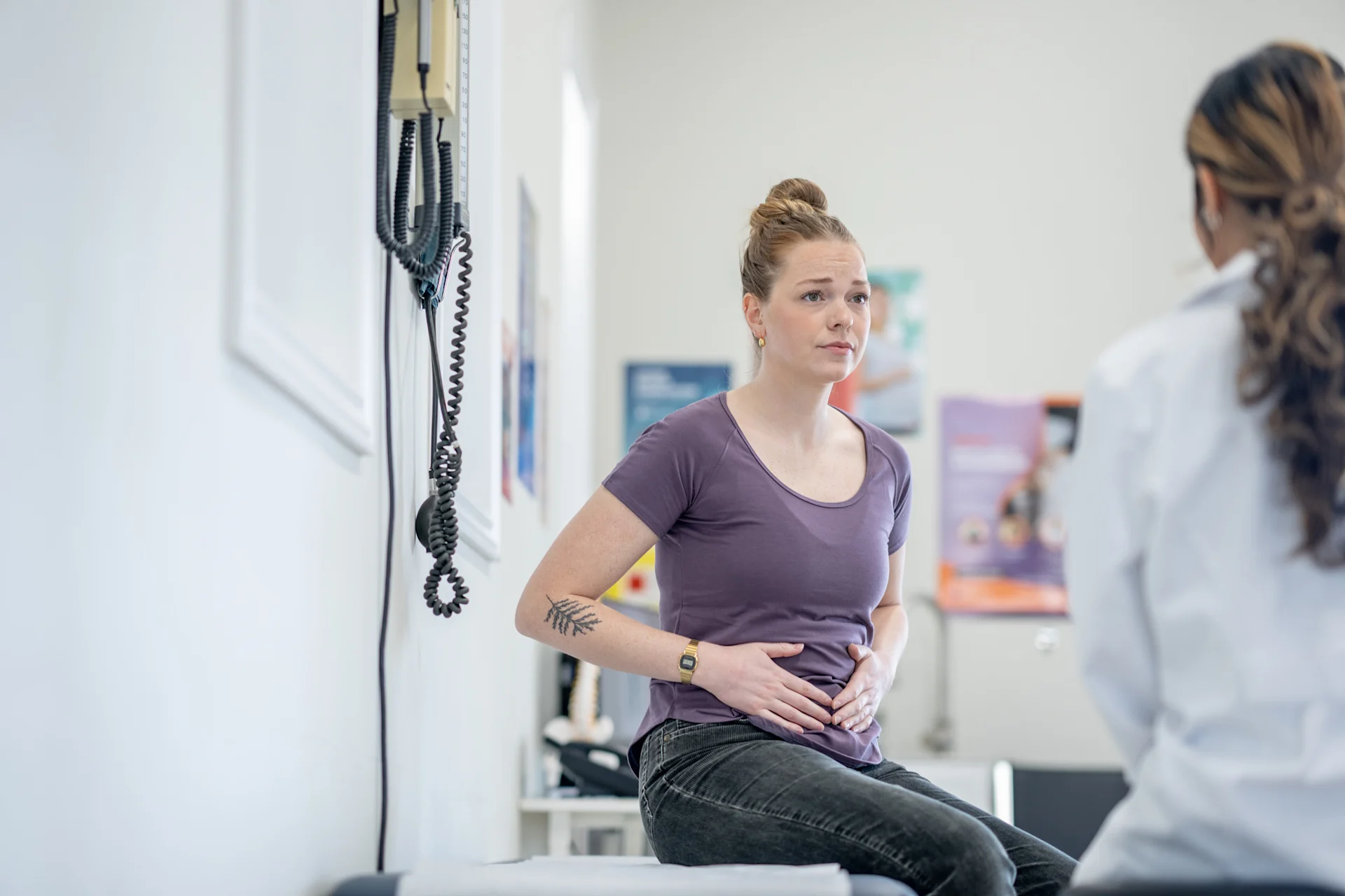 Woman holding her stomach