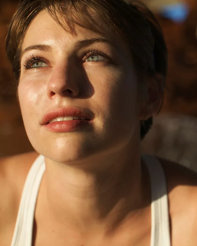 Woman looking out into sun