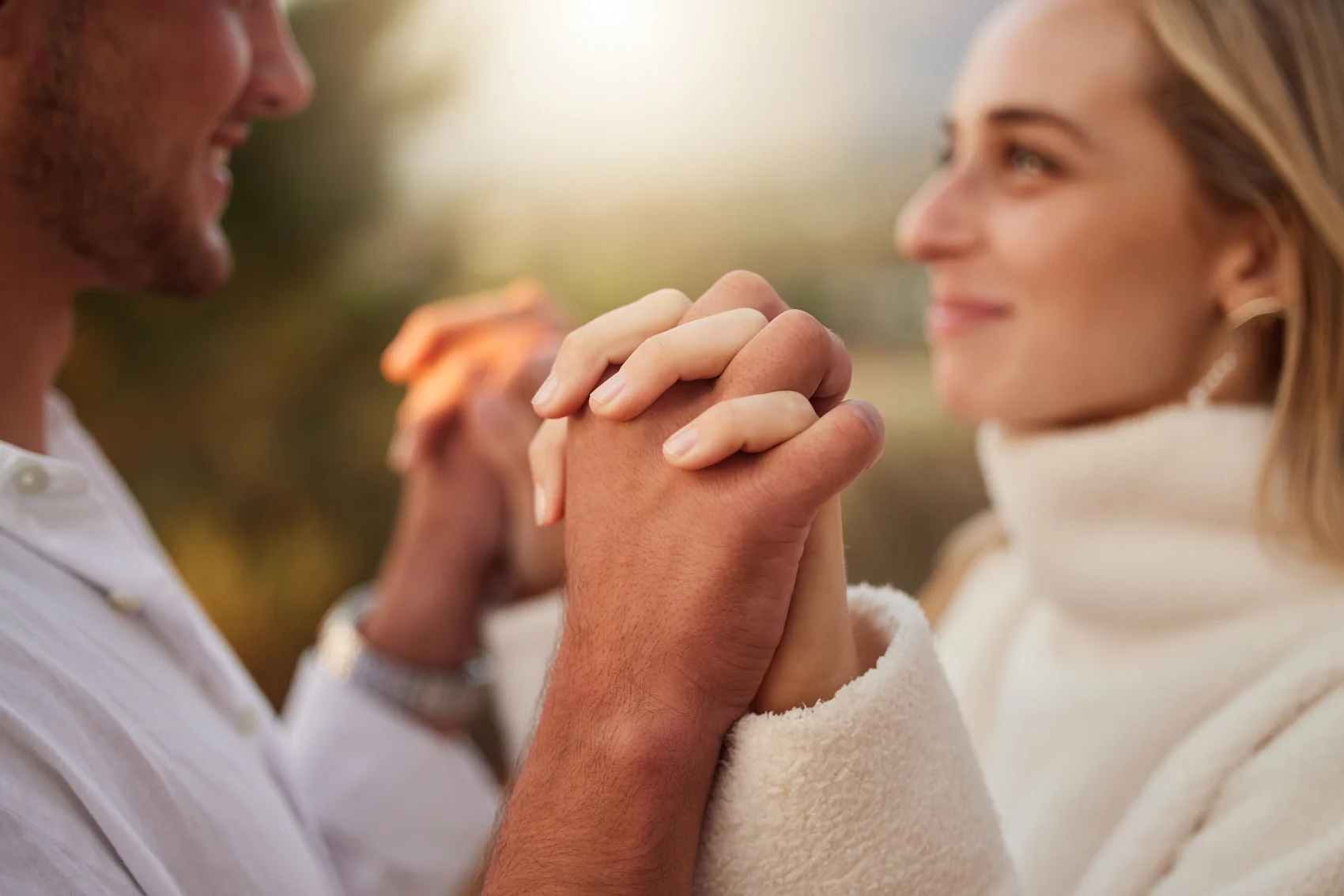 Couple holding hands