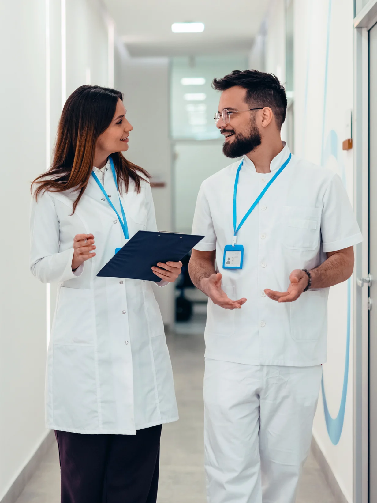 Medical professionals talking in hallway