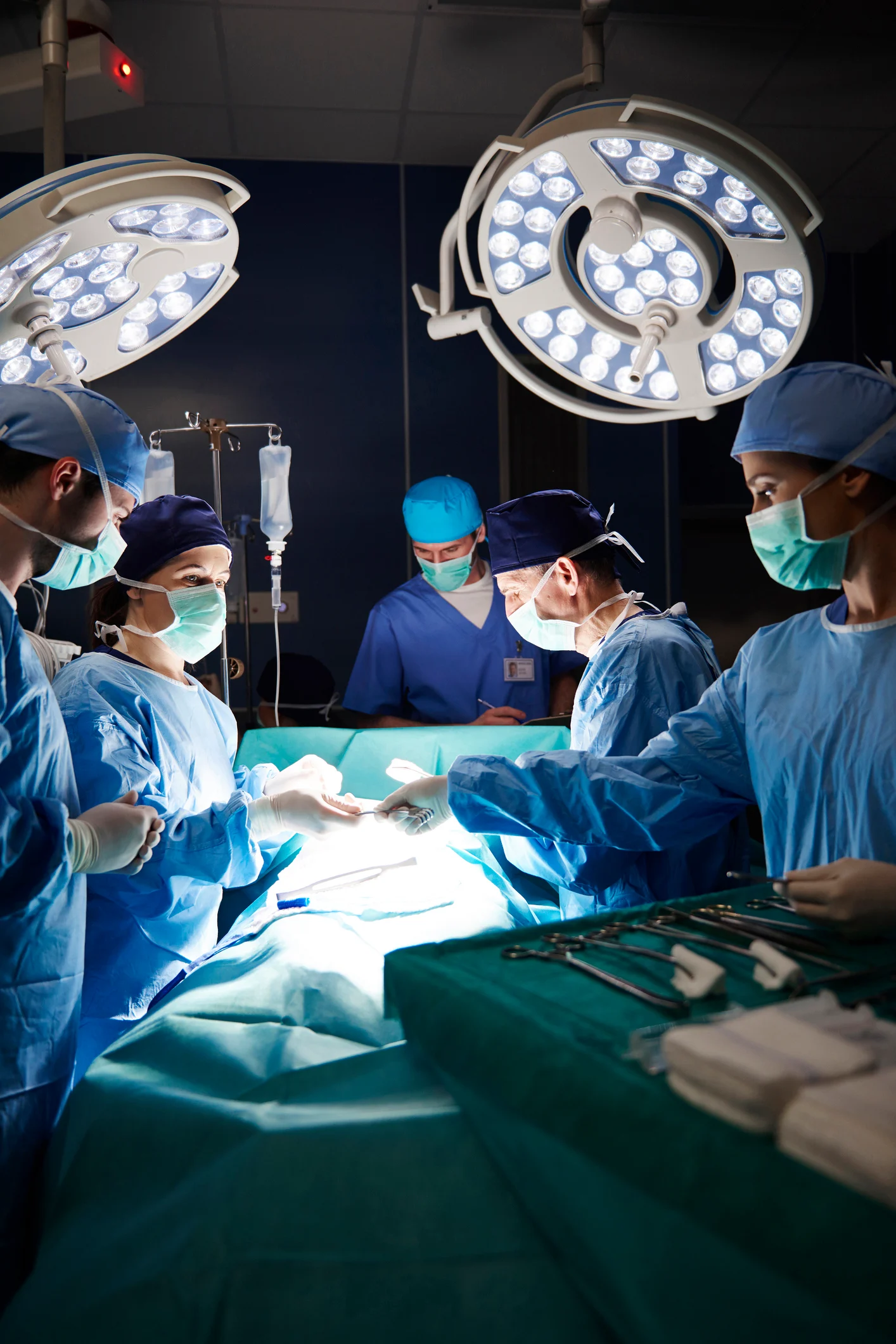 Surgeons in bright operation room