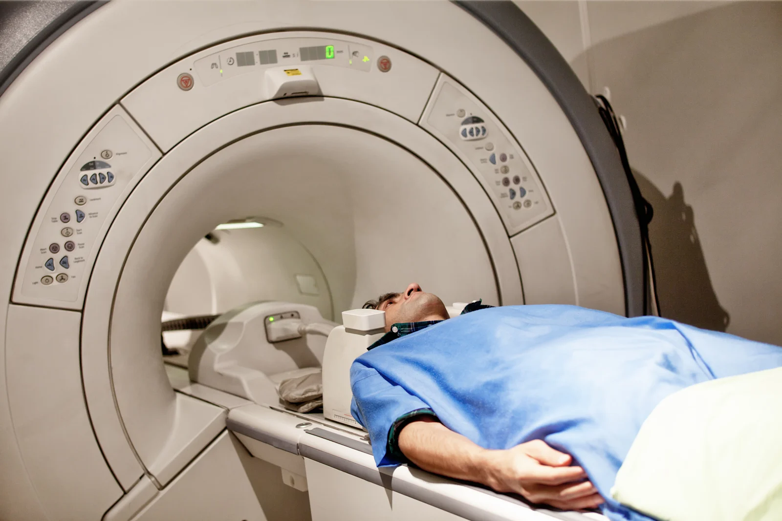 Person goes into MRI