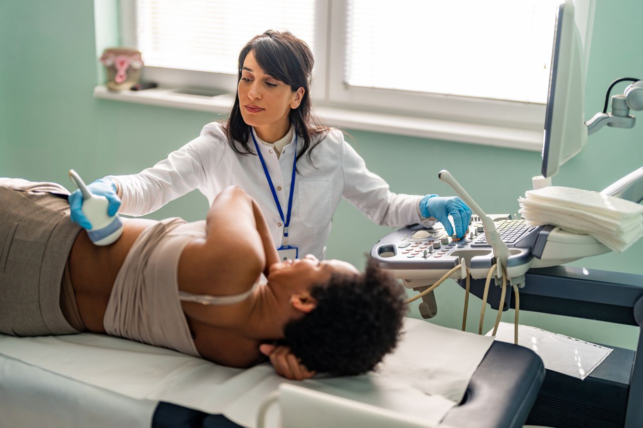 Doctor performing ultrasound