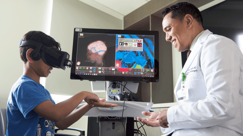 Doctor and patient using virtual reality