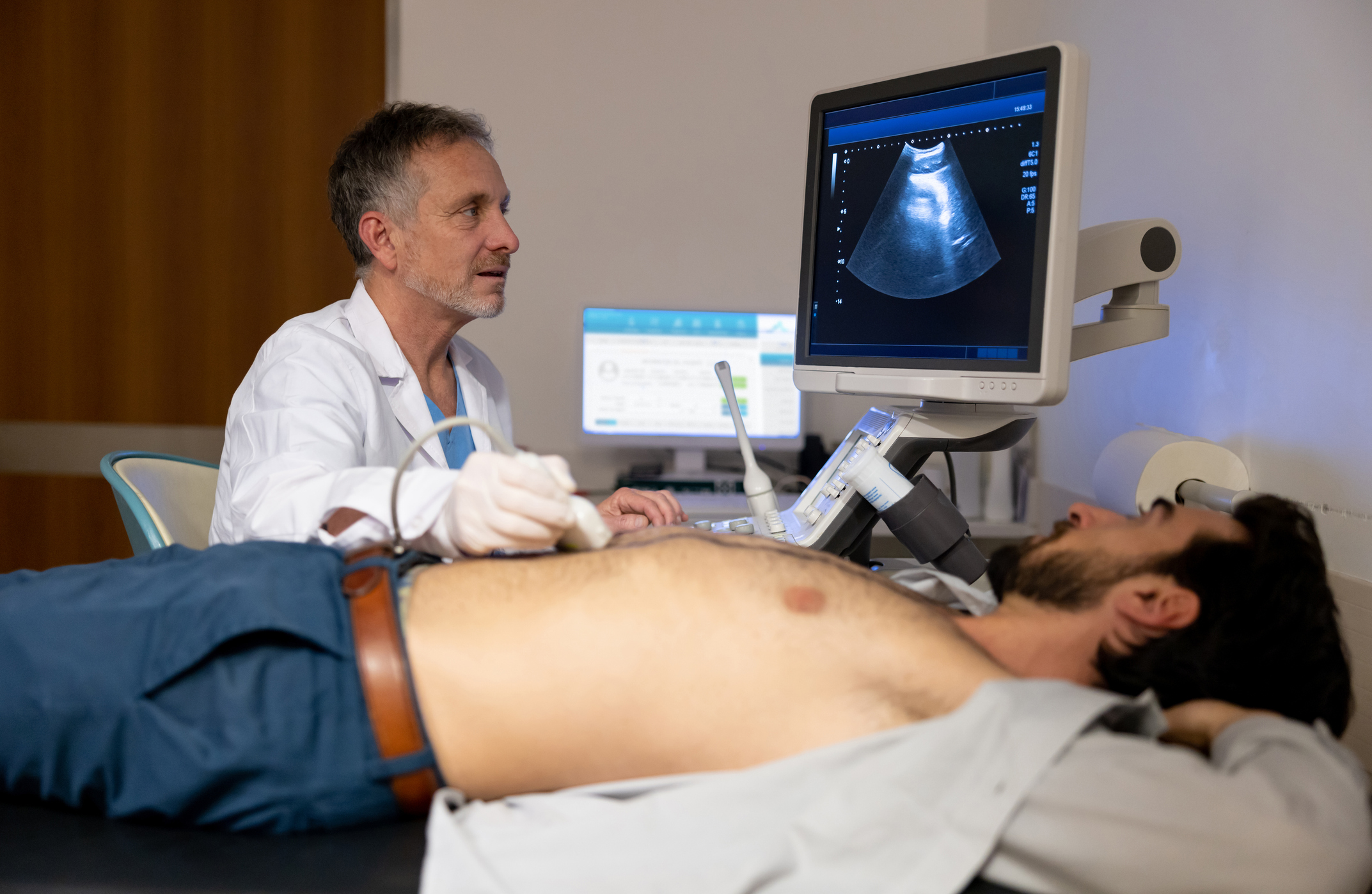 Man receiving ultrasound on stomach