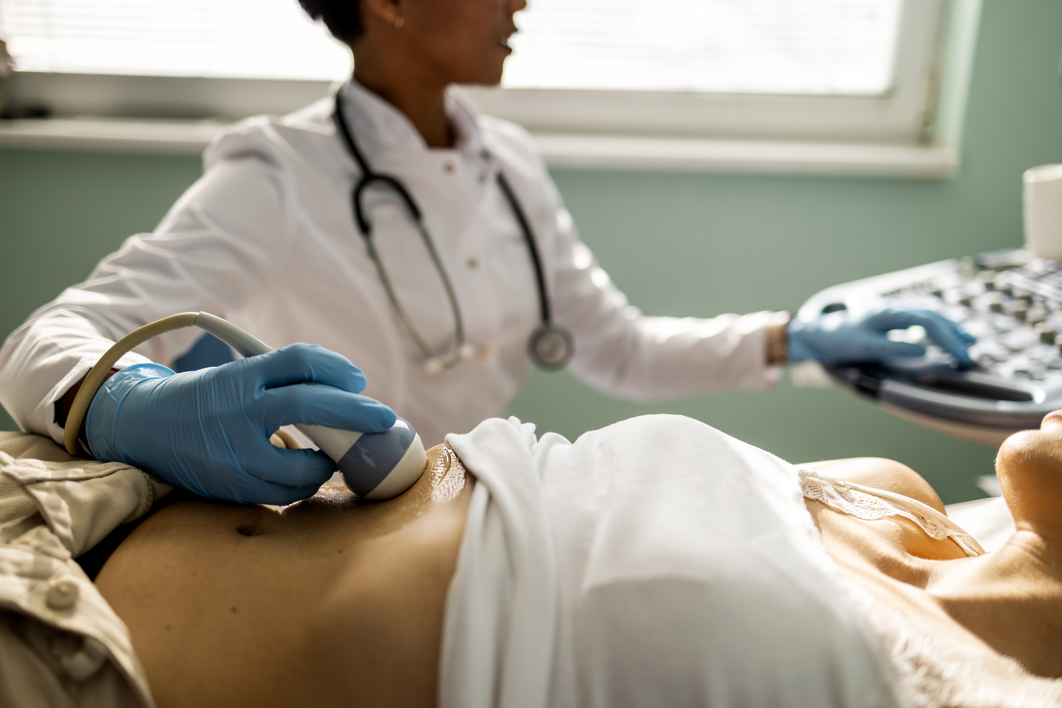 Woman receiving gut ultrasound
