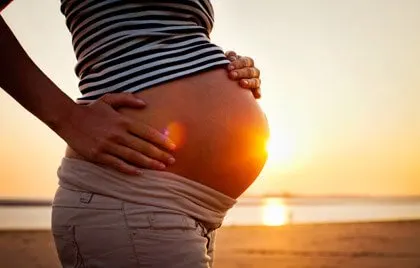 Baby bump in the sunset
