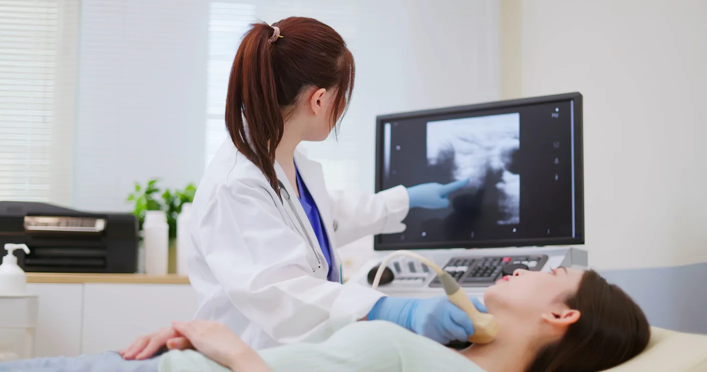 Physician and patient throat exam