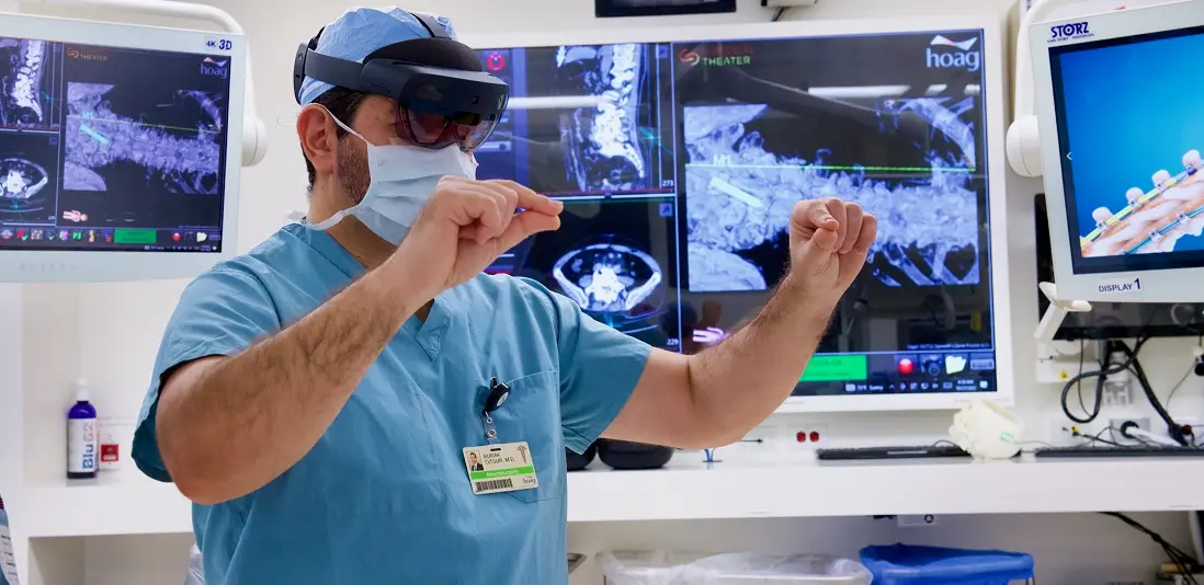 Dr. Ozgur using AR technology in OR