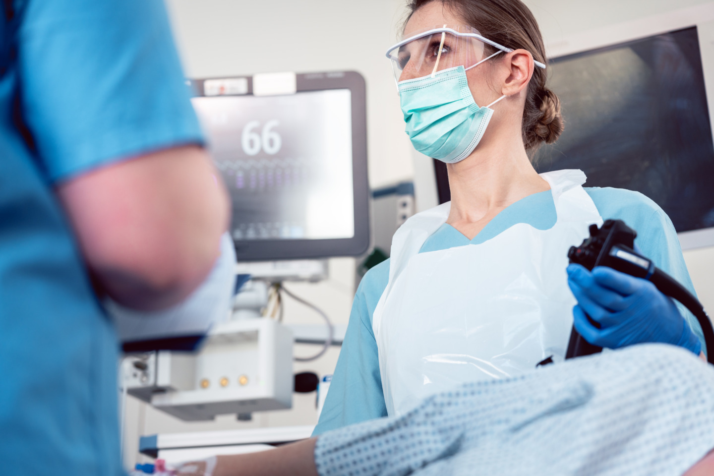 Doctor performing colonoscopy