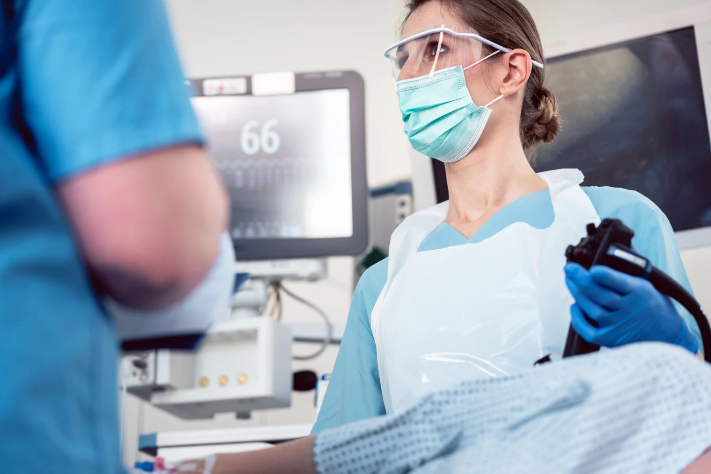 Doctor performing colonoscopy