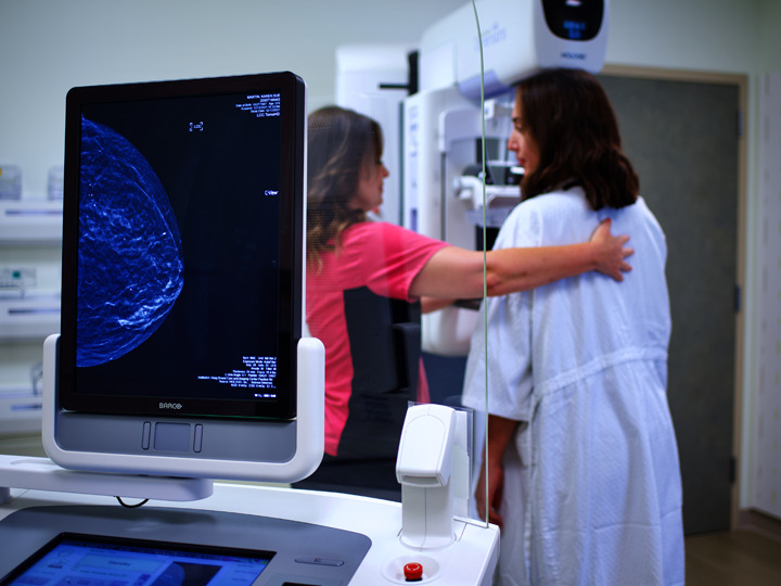 Provider conducting mammography screening