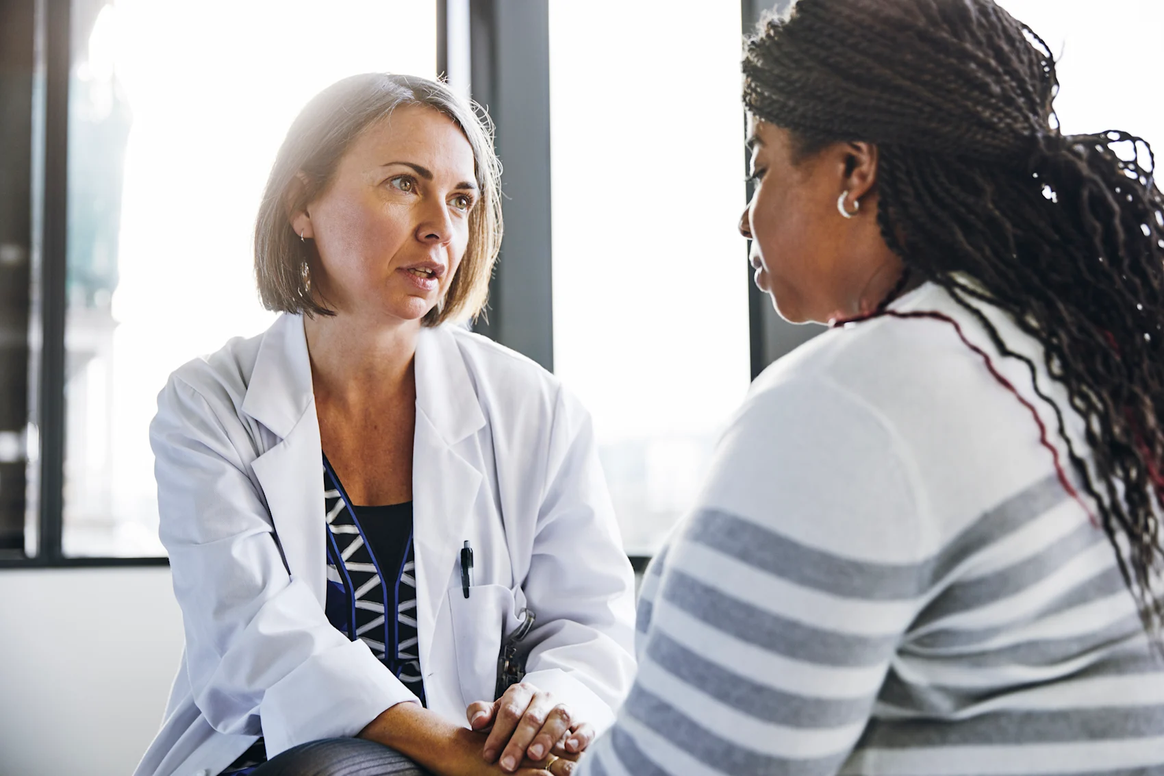 Doctor counseling patient