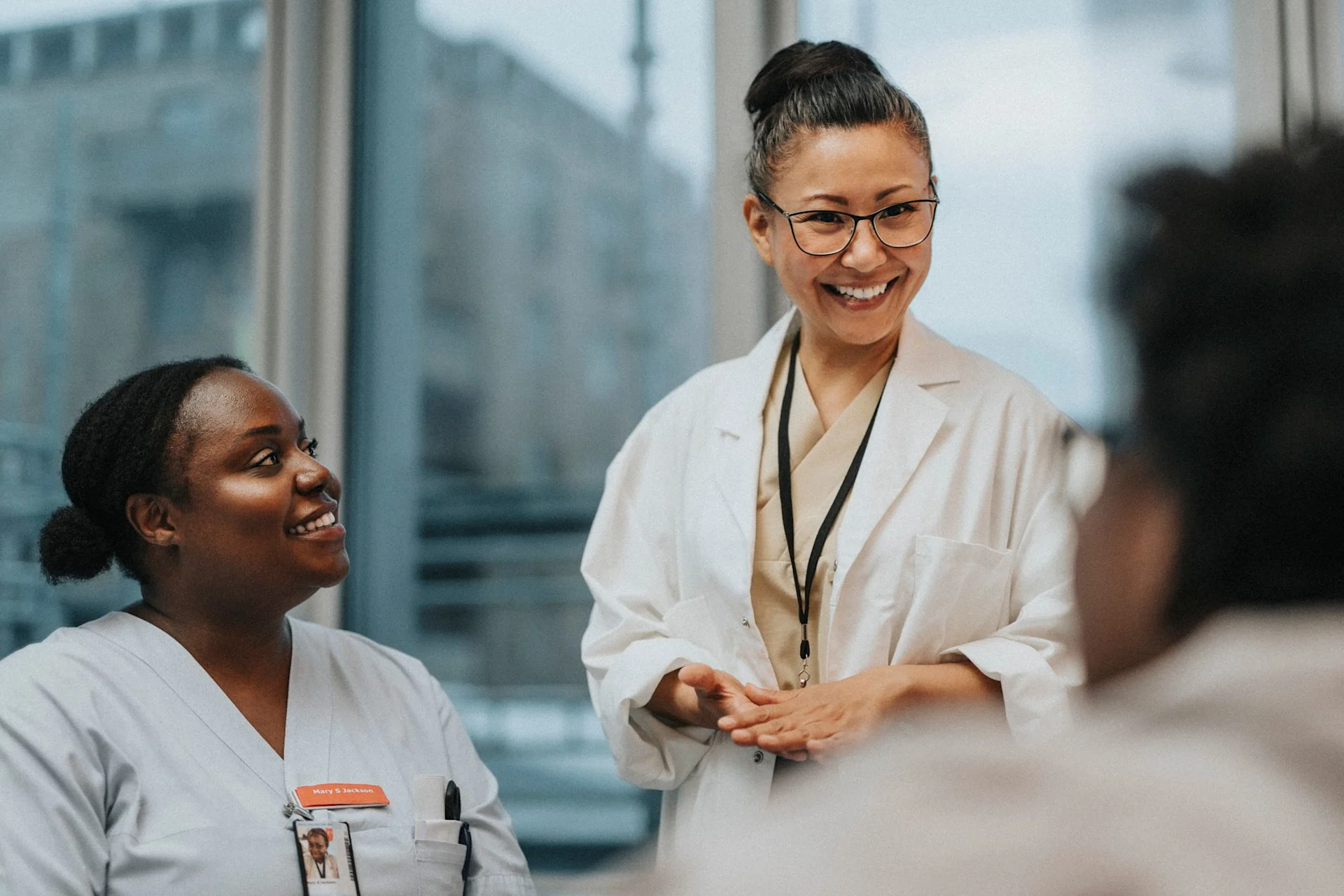 A group of doctors meeting with one another