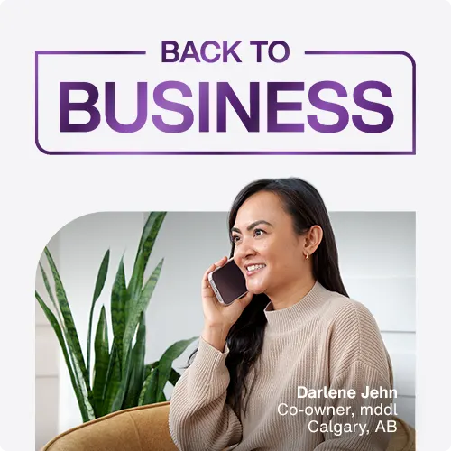 Female business owner, Darlene Jehn, sitting while on the phone.
