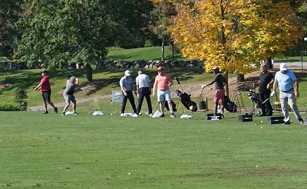 TELUS Swing for a Cure trophy and gifts for participants.